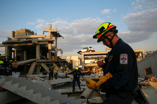 Rescue specialists work at the scene of a mock disaster area during a training exercise in Perry, Georgia.