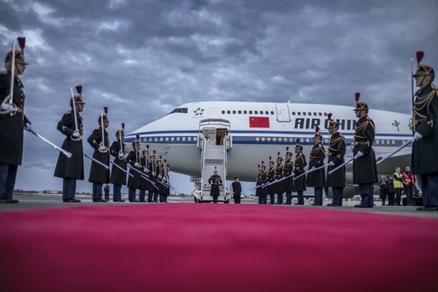 Honour guards prepare to leave after the arrival of China's President Xi Jinping at the Lyon Saint-Exupery Airport. Xi is in France for a three-day state visit.