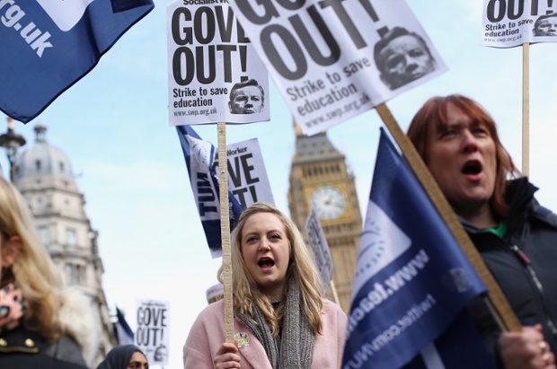 Teachers take part in a rally through Westminster during a one-day walkout across England and Wales.