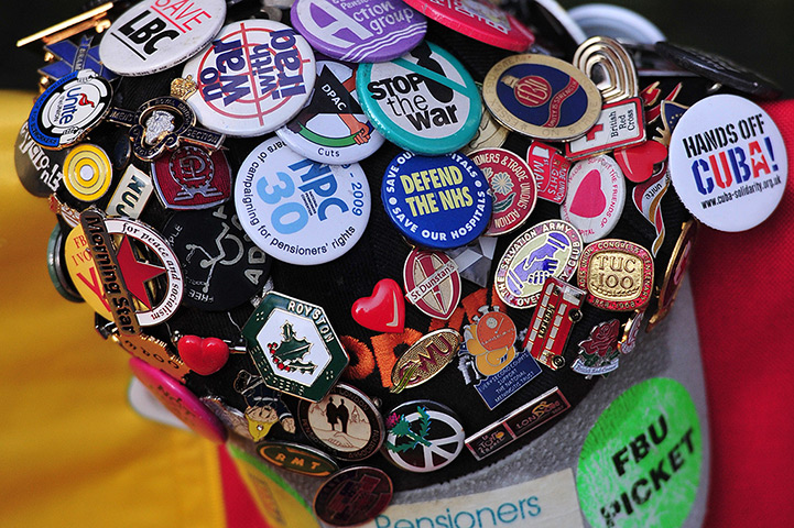 Tony Benn funeral: A cap covered in campaign badges outside the funeral 