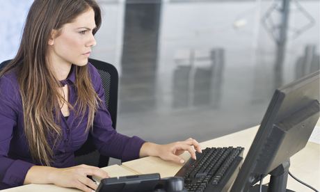 Woman workin at a computer