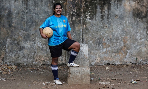 Rachel Blaekly, an 18-year-old student, poses during a football practice session at a playground in Mumbai. Rachel said that she wants stricter laws for women security from the new government after the elections.