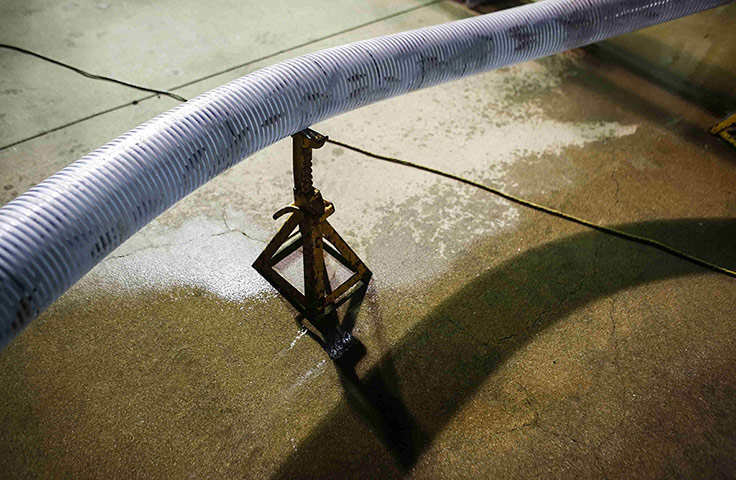 20 Photos: Chinook salmon smolts pumped into a dewatering tower in California