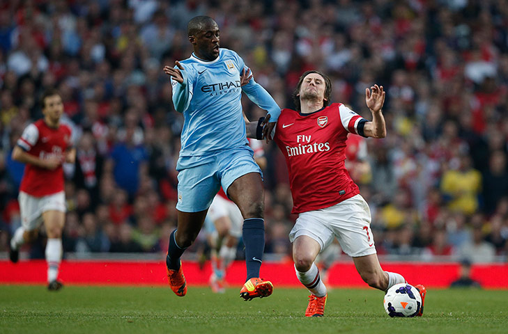arsenal v manchester city: Toure fouls Rosicky