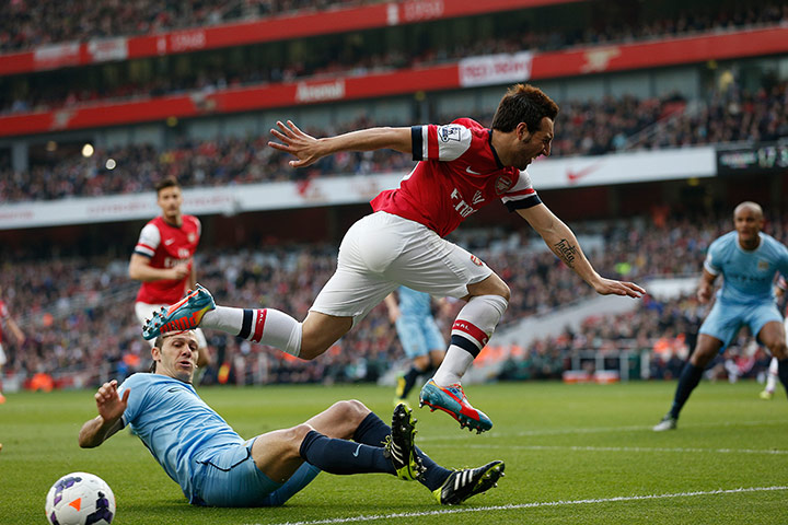 arsenal v manchester city: Martin Demechelis puts a stop to Santi Cazorla