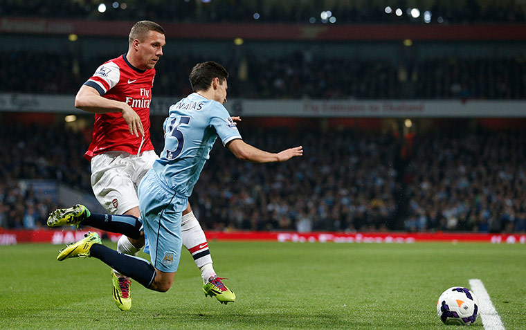 arsenal v manchester city: Podolski and Navas