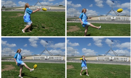 Liberal MP Fiona Scott shows her skills playing footy during a Footys4all Foundation event outside Parliament House.