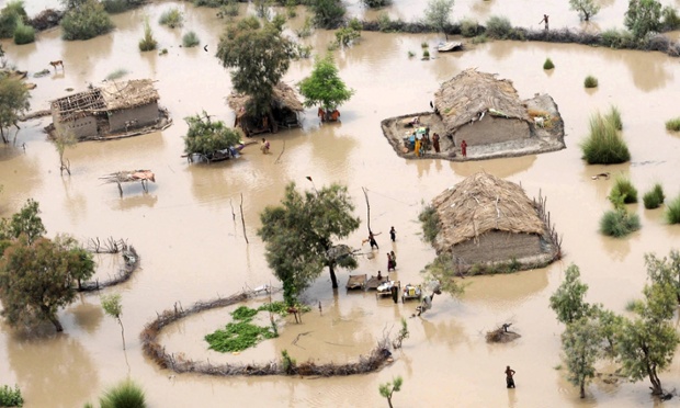 File picture taken on August 9, 2010 shows an aerial view from a Pakistan army rescue helicopter of residents in a flood-affected area on the outskirts of Sukkur. South Asia is the world's most climate-vulnerable region, its fast-growing populations badly exposed to flood, drought, storms and sea-level rise, according to a survey of 170 nations published on October 20, 2010. UN scientists are set to deliver their darkest report yet on the impacts of climate change, pointing to a future stalked by floods, drought, conflict and economic damage if carbon emissions go untamed, during the Intergovernmental Panel on Climate Change (IPCC) in Yokohama beginning today.