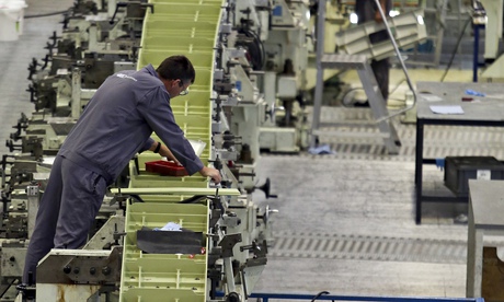 GKN employees work on the wing of an Airbus A380
