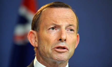 This picture taken on December 16, 2013 shows a Australia Prime Minister Tony Abbott speaks at a press conference in Sydney.  Abbott defended the government's secrecy over its border protection policy on January 9, 2014, after reports that boats had been turned back to Indonesia and asylum-seekers mistreated. AFP PHOTO / Saeed KHANSAEED KHAN/AFP/Getty Images