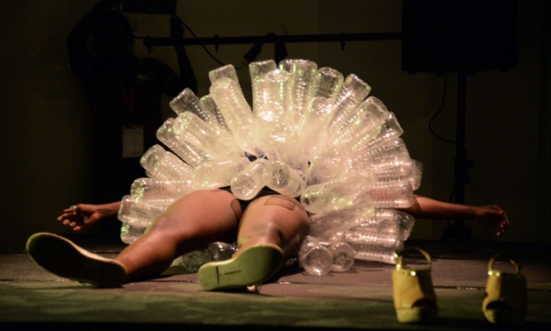 Dancer Nadia Beugre performs on stage wearing plastic bottles during the African Performing Arts Market festival in the Ivory Coast.