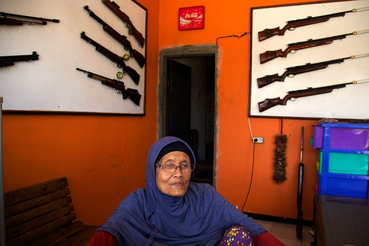 Air rifle capital: An air rifle shopkeeper waits for customers at her shop 