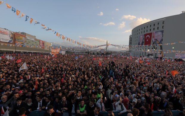 Supporters of Turkish Prime Minister Recep Tayyip Erdogan show their support as he addresses a rally of his Justice and Development Party in Malatya, Turkey. Turkey hold nationwide municipality elections on March 30, 2014.