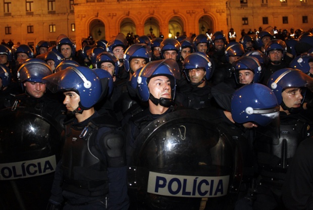 Blue on Blue in Lisbon: Portuguese riot police officers guard  the Portuguese parliament against a demonstration by thousands of Portuguese policemen and other security forces against salary cuts and general austerity measures. 