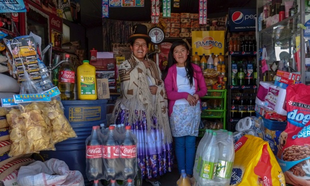 International Women's Day is observed. Here Lucia Mayta, 43, and her daughter Luz Cecilia, 12, inside their bodega in La Paz.