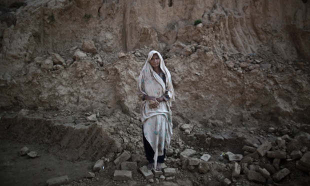 Amna Bhatti, 60, a Pakistani brick factory worker, at the site of her work in Mandra, near Rawalpindi, Pakistan. Amna is in debt to her employer the amount of 150,000 rupees (approximately 1,500 GBP).