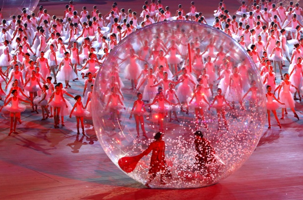 Young dancers take part in the Opening Ceremony of the Sochi 2014 Paralympic Winter Games at Fisht Olympic Stadium.