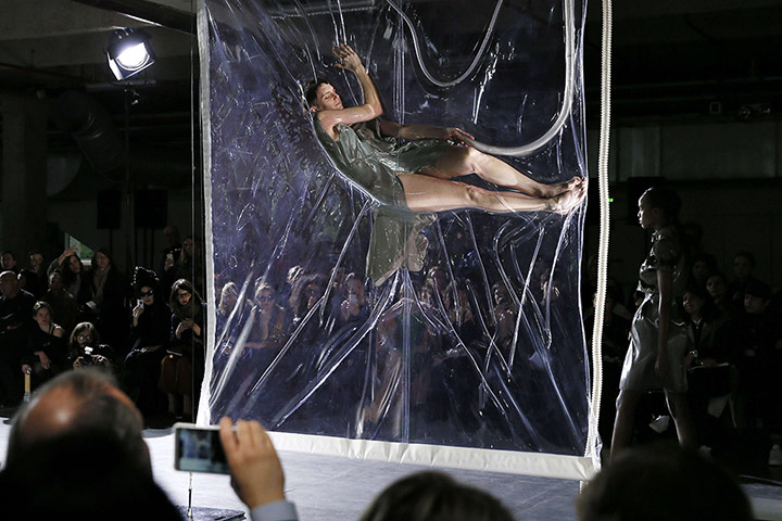 20 Photos: A model displays a design by Iris Van Herpen at Paris fashion week
