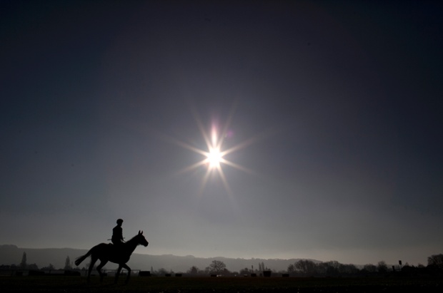 Oxrock ridden by Katie Walsh goes for a morning exercise session on the Cheltenham Gallops.