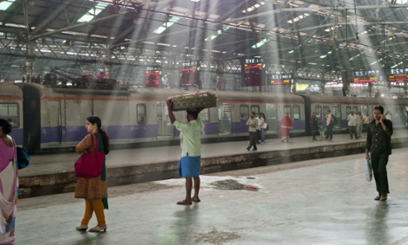 People on a platform inside Chhatrapati Shivaji Terminus railway station in Mumbai, India Mumbai, India.