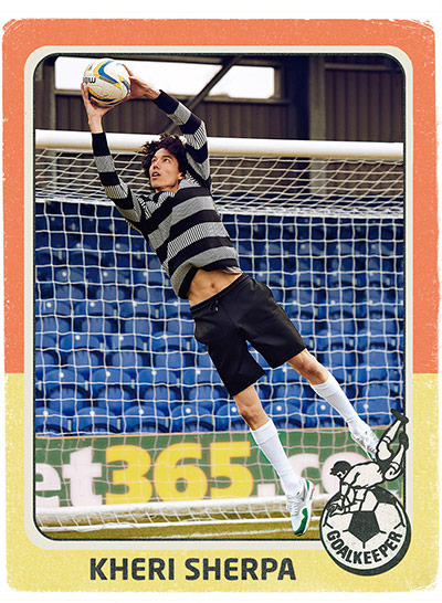 Panini fashion shoot:  jumper striped grey black black shorts white socks trainers