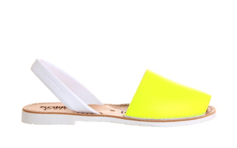 50 best flat sandals: 50 of the best flat sandals - neon yellow with white strap by Solillas