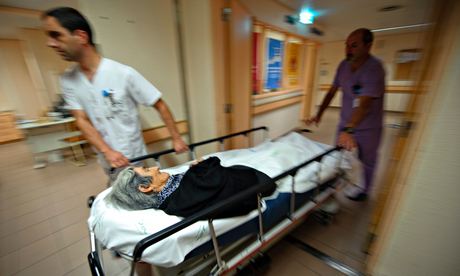 old woman on stretcher
