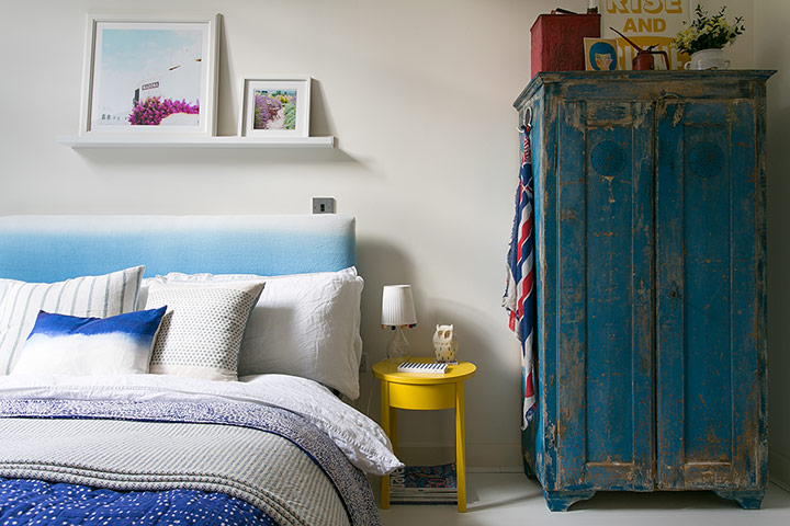 To Boldly Go - homes: bedroom with blue distressed cabinet and blue bed