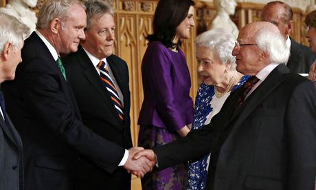 Ireland's President Higgins greets Northern Ireland's Deputy First Minister McGuinness