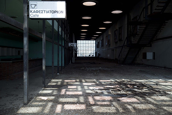 20 Photos: A cafe sign is seen at the abandoned Nicosia international airport