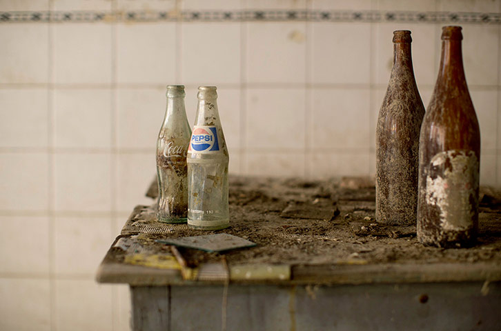 From the agencies: Bottles on a table at an abandoned cafe in the UN buffer zone in Nicosia
