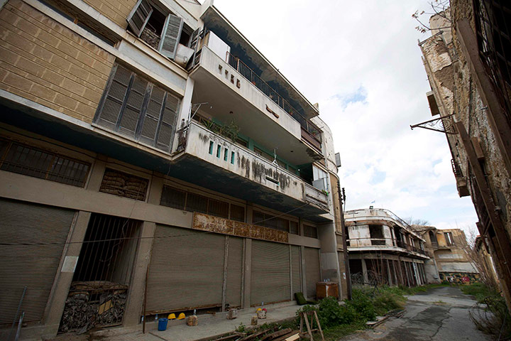 From the agencies: A former commercial street is seen in the UN buffer zone in central Nicosia