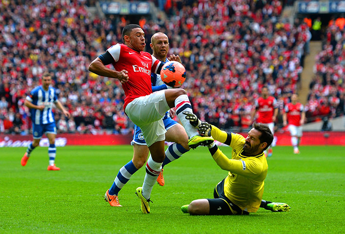 FA Cup semi: Scott Carson is out quickly to deny Alex Oxlade-Chamberlain