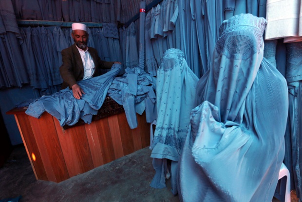 Burqa clad women in a shop selling the traditonal garment, in Herat, Afghanistan.