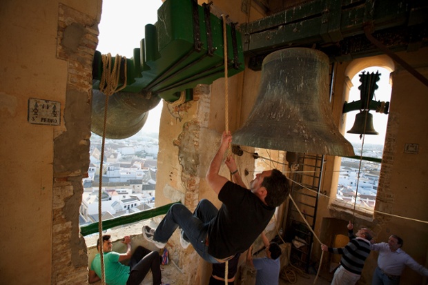 The bell ringers in Santa Marta de la Mesa Church perform on the eve of Palm Sunday in Utrera, Spain.