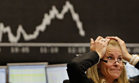 A broker reacts at the stock exchange in Frankfurt in September 2008 after the US crisis