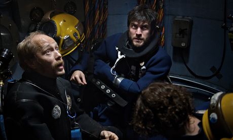 Two deep sea divers in a chamber, from the film Pioneer