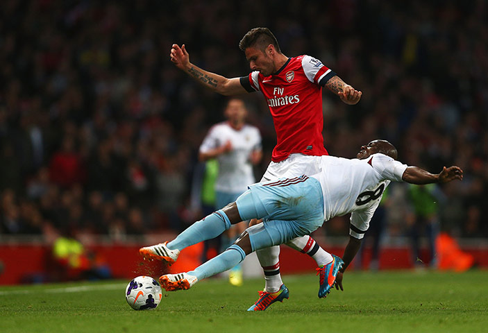 Arsenal v West Ham: Olivier Giroud, here holding off Pablo Armero