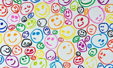 Wax crayon coloured drawing of happy smiling faces