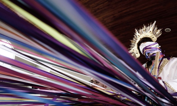 Christian believers take part in the ribbons procession as part of the Holy Week before Easter, in Cot, Costa Rica.