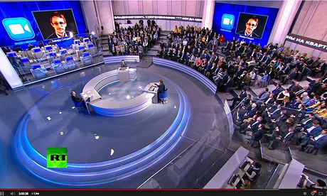 Edward Snowden appears via video for Putin press conference 