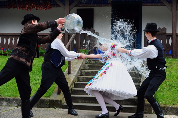 Hungarian children celebrate Easter with a traditional fertility ritual which involves watering the girls. In Kalocsa, some 100 km south of Budapest the boys take on their roles as waterers with gusto.  