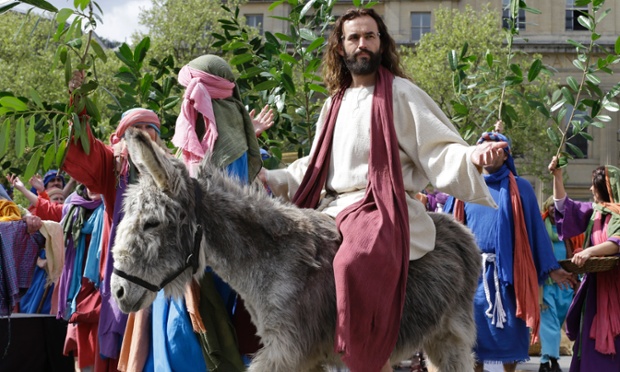 James Burke-Dunsmore plays the part of Jesus Christ in performance of The Passion of Jesus in Trafalgar Square in London by the Wintershall Players