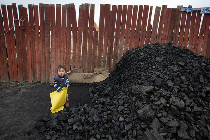 Mongolia gallery: Coal for sale by the roadside in Ulan Bator.