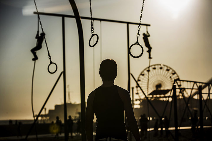 20 Photos: Beachgoers exercise at Santa Monica in Los Angeles, California