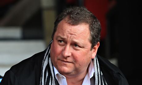 Sports Direct founder Mike Ashley takes his seat at a Newcastle match