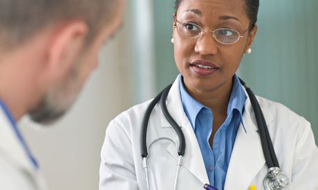 Doctor listening to patient