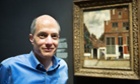 Alain de Botton poses in front of an artwork at the Rijksmuseum in Amsterdam.