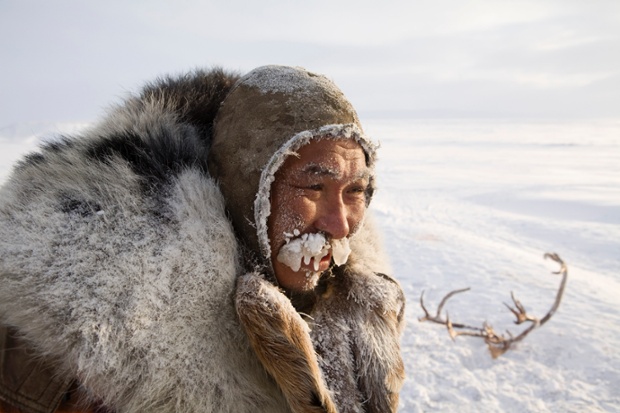 Grisha Rahtyn, a Chukchi reindeer herder, iced up at -30 C after working with his reindeer during the winter.Chukotskiy Peninsula, Chukotka, Siberia,