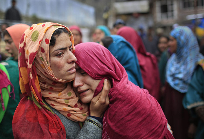 20 Photos: Relatives during the funeral procession of Zia-Ul-Haq in Hirpora, India